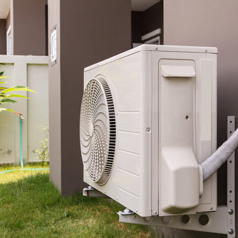 Air conditioner compressor outdoor unit installed outside the house Air conditioner compressor outdoor unit installed