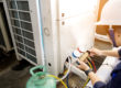 Spectroline HVAC Technician checking pressure